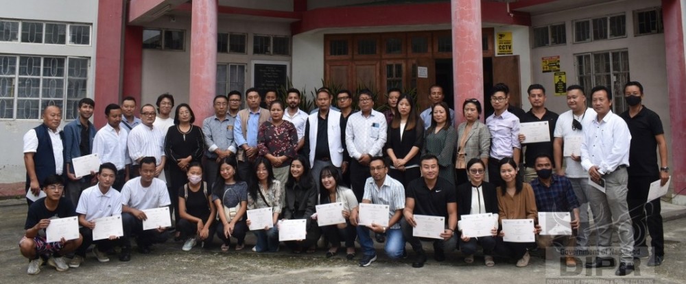 Advisor S Keoshu Yimkhiung with trainees and officials after the valedictory programme for FTII training in Kohima August 10. (DIPR Photo)